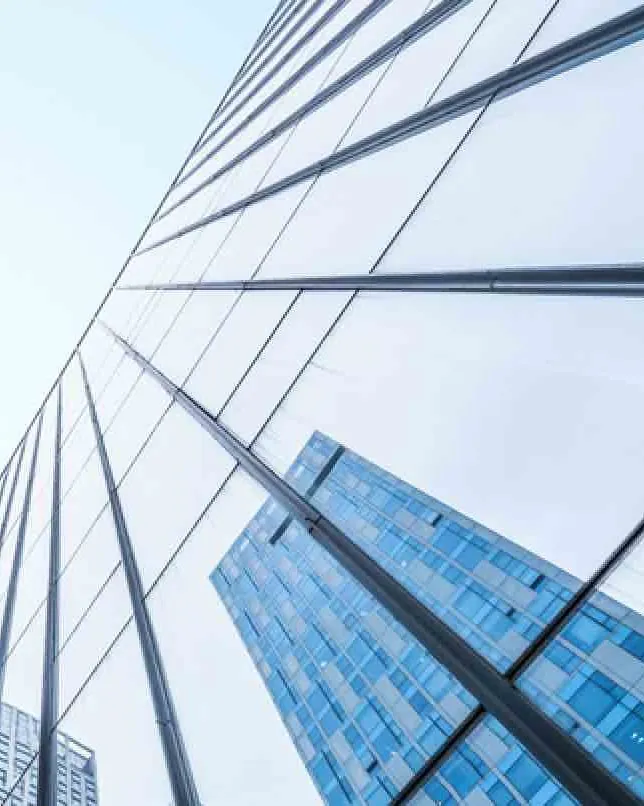 Glass office towers seen from below